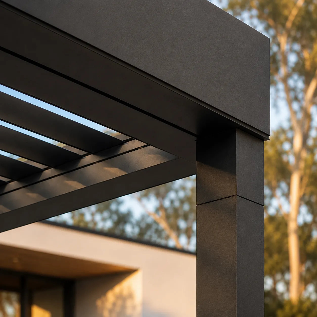 Close-up detail of a matte charcoal aluminium louvered pergola corner - ASG Shading Melbourne